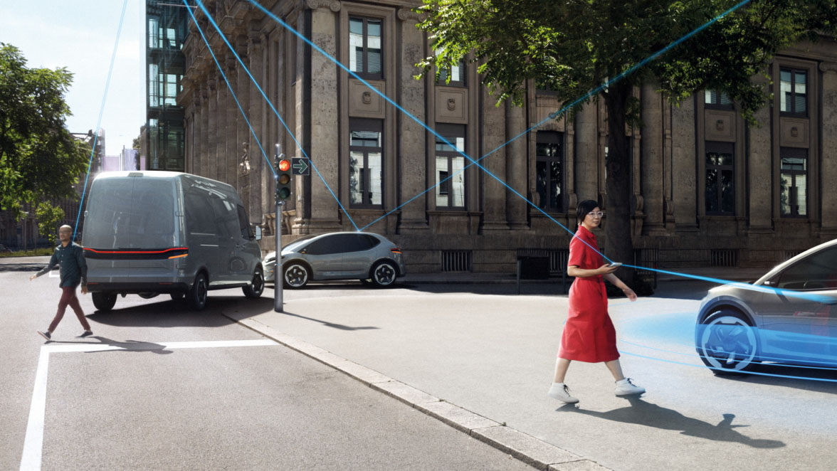 Scene depicting an intersection; vehicles, pedestrians with smart devices, and infrastructure are connected by lines that reach into the sky.